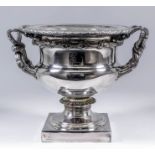 A 19th Century plated two-handled wine cooler in the style of the Warwick vase, with bead mounts,