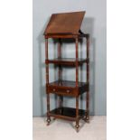 A late George III mahogany four tier rectangular whatnot with adjustable reading slope to top, on