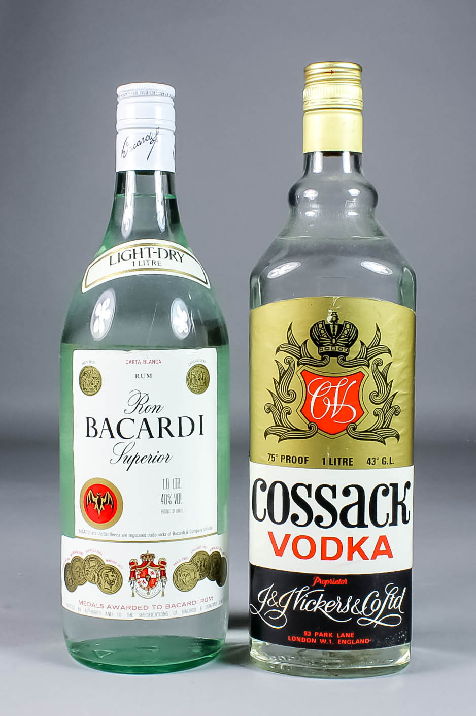 Four one litre bottles of Bacardi Light Rum (40% proof), and eight other bottles of Vodka (various