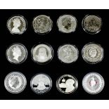 A collection of fifty-eight Elizabeth II Commemorative coins from Countries and States across the