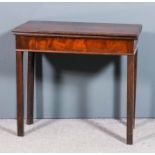 A George III mahogany rectangular tea table, the plain folding top with moulded edge, on square