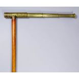 A 19th Century novelty walking stick, the cane shaft mounted with brass three draw telescope by W.