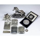 An Edward VII plain silver rectangular card case with patent tambour slider to front, 4ins x 2.5ins,