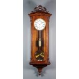 A late 19th Century oak cased "Vienna Regulator" by Camerer Cuss & Co, 56 New Oxford Street, London,