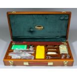 A new cased 12 bore gun care kit by Parker-Hale, consisting of hardwood polished box, containing