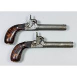 A pair of early 19th Century Continental percussion travelling pistols, 4ins engine turned barrels