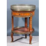 A French rosewood and gilt metal mounted circular two tier occasional table of "Louis XVI" design,