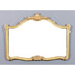 A 19th Century gilt framed rectangular wall mirror with arched top, the shaped and moulded frame