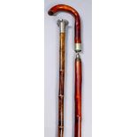 An early 20th Century novelty walking cane, the bamboo shaft with engraved silver collar for