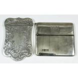 A Victorian silver card case of shaped outline, engraved with floral and leaf scroll ornament, 4.