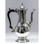 A George V silver baluster-shaped coffee pot with bead mounts, the slightly domed cover with acorn