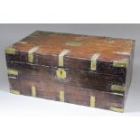 A 19th Century Anglo-Indian brass bound hardwood writing box, the fitted interior with fold out