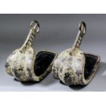 A pair of Japanese iron and silver inlaid Samurai yoroi horse stirrups (abumi), inlaid with a