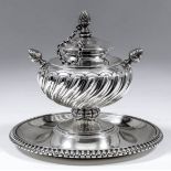 A Victorian silver circular oil lamp, the bulbous body with spiral reeded ornament, with pineapple