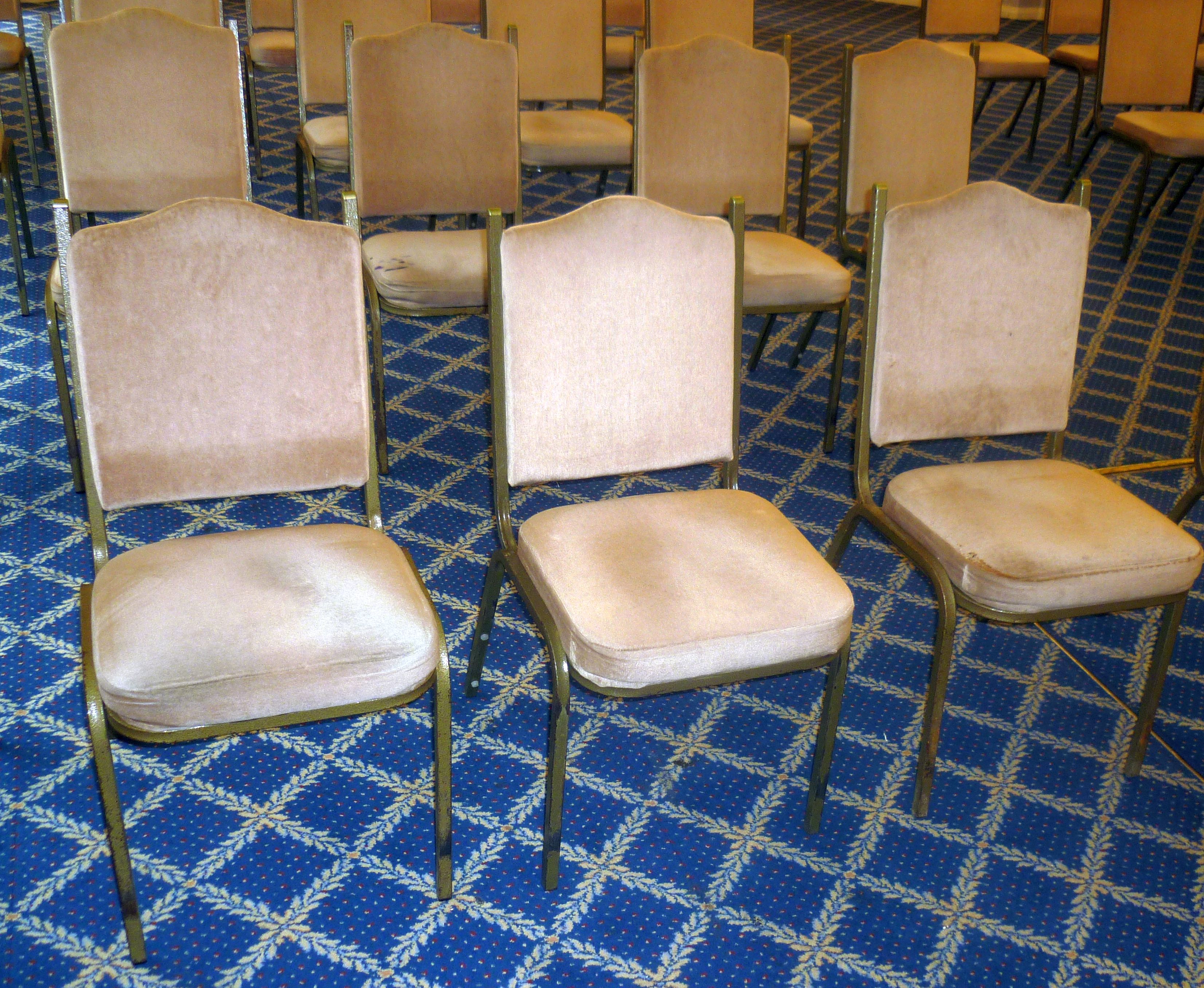 *A set of 20, stackable metal framed dining/ meeting chairs with padded backs and seats covered in