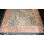 *Antique Persian style rug of floral design with blue centre and red border, 92" x 67"