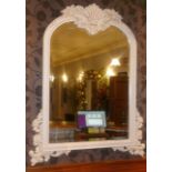 *White framed wall mirror with bevel edged plate and floral frame, 48" x 37"