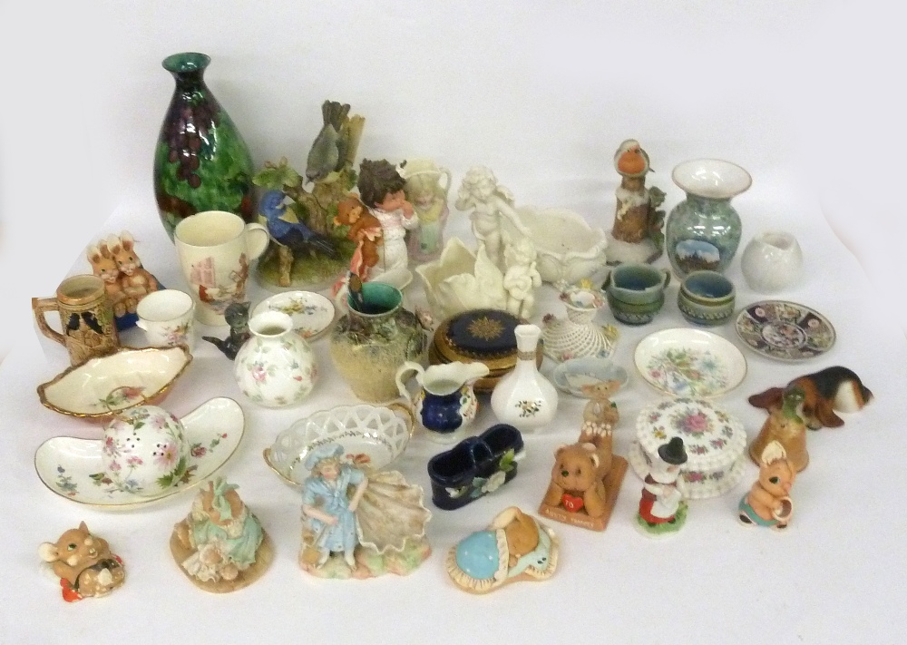 A QUANTITY OF DECORATIVE ORNAMENTS TO INCLUDE VARIOUS BISQUE FIGURES, MOORCRAFT ORNAMENTS, VARIOUS