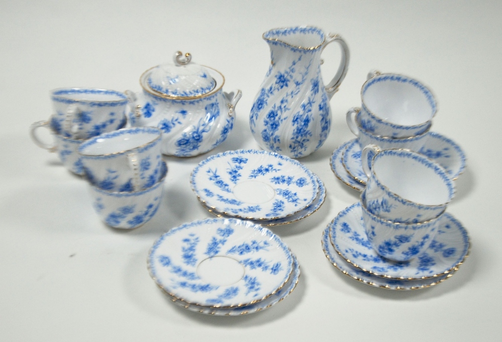 EIGHTEEN PIECE GERMAN BLUE AND WHITE PORCELAIN TEA SET FOR EIGHT PERSONS, wrythen handled and floral