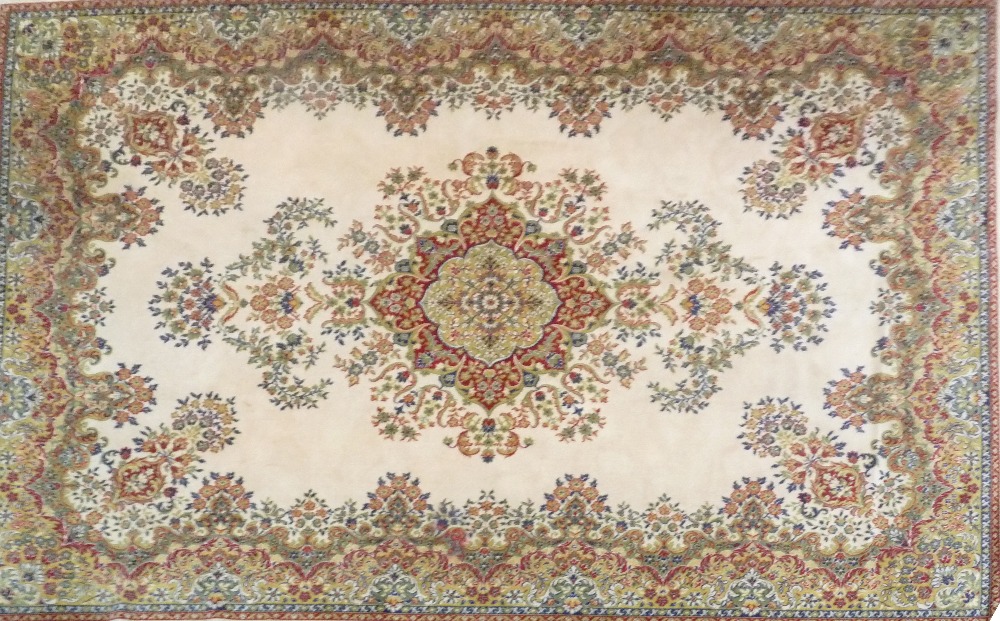 BELGIUM 'ARAKSTAN' DE LUXE PURE NEW WOOL PILE CARPET, of Persian style, the cream field having a