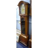 BRAVINGTONS LTD. LONDON, EARLY TWENTIETH CENTURY MAHOGANY LONGCASE CLOCK, the 11" brass dial with