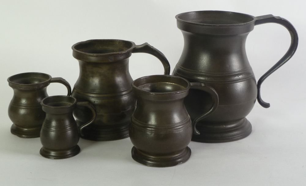 GRADUATED SET OF FIVE VICTORIAN PEWTER 'BELLY' MEASURES, Half gill quart, 2 3/4" x - 6 1/4" (7cm -