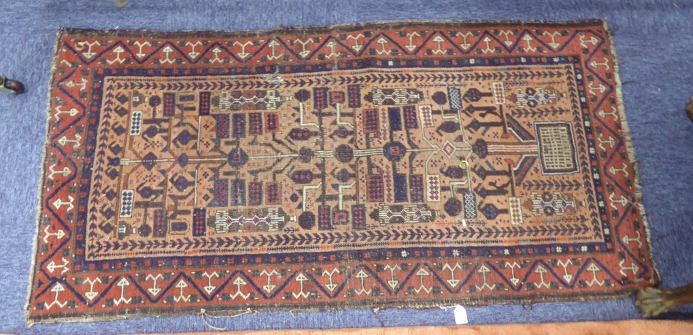 FINELY KNOTTED KIRMAN RUG, with star shaped centre medallion with pendants on a pink field scattered