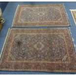 PAIR OF EARLY 20th CENTURY KASHAN PERSIAN RUGS each with concentric diamond shaped centre