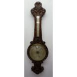 A. MORRISON, OPTICIAN, 41 DEANSGATE, MANCHESTER, BAROMETER, in carved mahogany banjo shaped case,