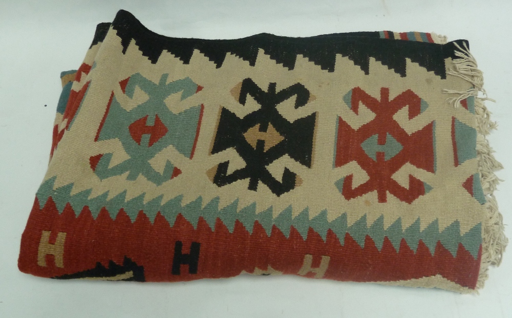 20th CENTURY CAUCASIAN KELIM in brick red, blue, turquoise, buff and black, the field with central