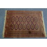 SALOR TURKHOMAN RUG with two rows of seven traditional Salor primary guls and three rows of