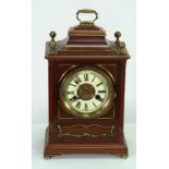 LATE NINETEENTH CENTURY MAHOGANY AND BRASS MOUNTED MANTEL CLOCK, in the Georgian style, the 4 1/2"
