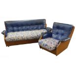 1960's LOUNGE SUITE OF THREE PIECES WITH TEAK PANEL ENDS AND FRAMES, BUTTON UPHOLSTERED IN DARK BLUE