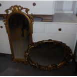 ARCH TOPPED BEVELLED EDGE WALL MIRROR IN GILT FRAME AND A GILT FRAMED OVAL MIRROR. HEIGHT OF