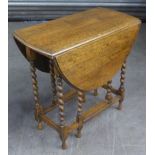 OAK BARLEY TWIST DROP LEAF OCCASIONAL TABLE. HEIGHT 73CM, LENGTH 77CM. C/R THERE IS A SPLIT DOWN THE