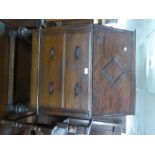 AN OAK BUREAU WITH TWO LONG DRAWERS BELOW