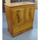 GOLDEN TEAK TWO DOOR TELEVISION CABINET WITH BOTTOM DRAWER. HEIGHT 101CM, LENGTH 92CM.