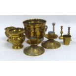 A PAIR OF EMBOSSED BRASS SHORT CANDLE HOLDERS AND OTHER BRASS ITEMS