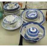 A QUANTITY OF BLUE AND WHITE POTTERY MEAT PLATES, A TEAPOT AND STAND, BOWL ETC....