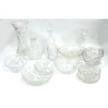 A SET OF FOUR CUT GLASS CRESCENT SHAPED SIDE SALAD DISHES, A LARGE CUT GLASS WAISTED FLOWER VASE (