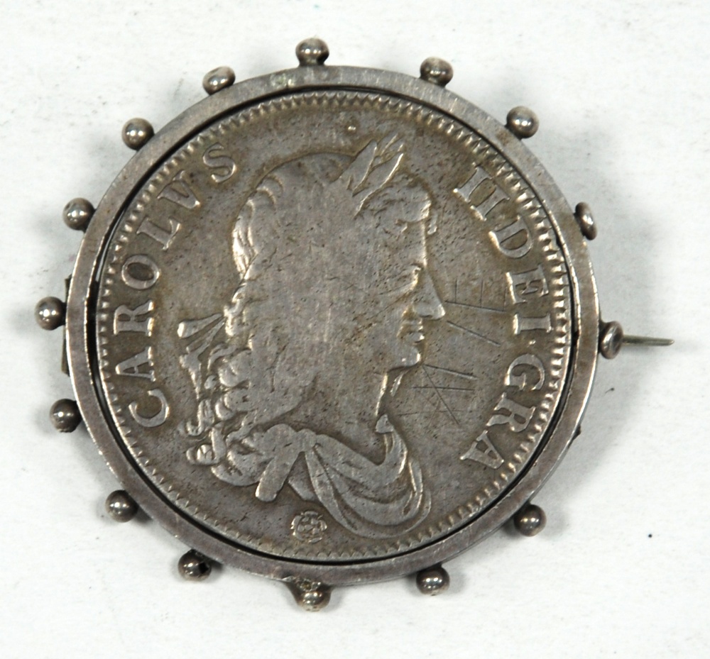 CHARLES II SILVER CROWN COIN 1662, dated on the reverse, first bust with rose below, now revolving