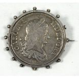 CHARLES II SILVER CROWN COIN 1662, dated on the reverse, first bust with rose below, now revolving