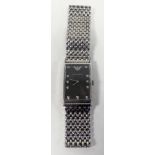 GENTS EMPORIO ARMANI QUARTZ WRIST WATCH, with oblong purple dial having eleven tiny diamond set