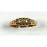 EDWARDIAN 18ct GOLD RING, with a setting of two tiny diamonds and two tiny blue stones (one missing)