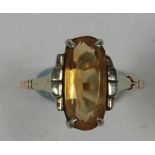 9 CT AR DECO RING set with a narrow oval citrine , 2.4 gms, in 'ALCA' cream bakelite Art Deco ring
