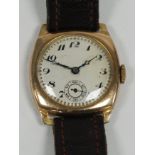 A GENTS 9ct GOLD CASED WRIST WATCH, with Swiss 15 jewel movement, silvered circular Arabic dial with