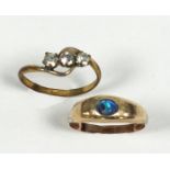 19th CENTURY GOLD COLOURED METAL RING gypsy set with oval abalone shell and a GILT METAL CROSS-