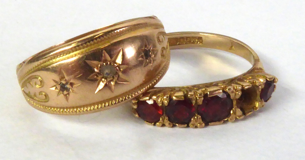 PROBABLY VICTORIAN 9ct GOLD RING, the broad lozenge shaped top, star set with three tiny diamonds,