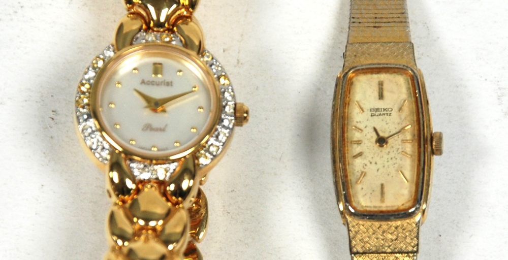 ACCURIST QUARTZ LADY'S GOLD PLATED BRACELET WATCH with 'Pearl' circular dial, paste set bezel,