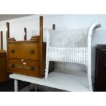 AN ART DECO STYLE OAK SMALL CHEST OF TWO LONG DRAWERS AND A WHITE LOOM TUB ARMCHAIR